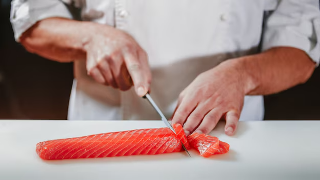 Chef preparando sashimi